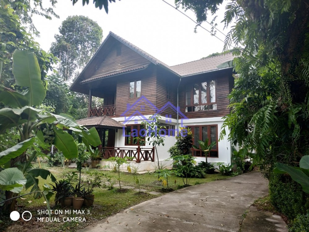 Modern Lao style house with garden and trees