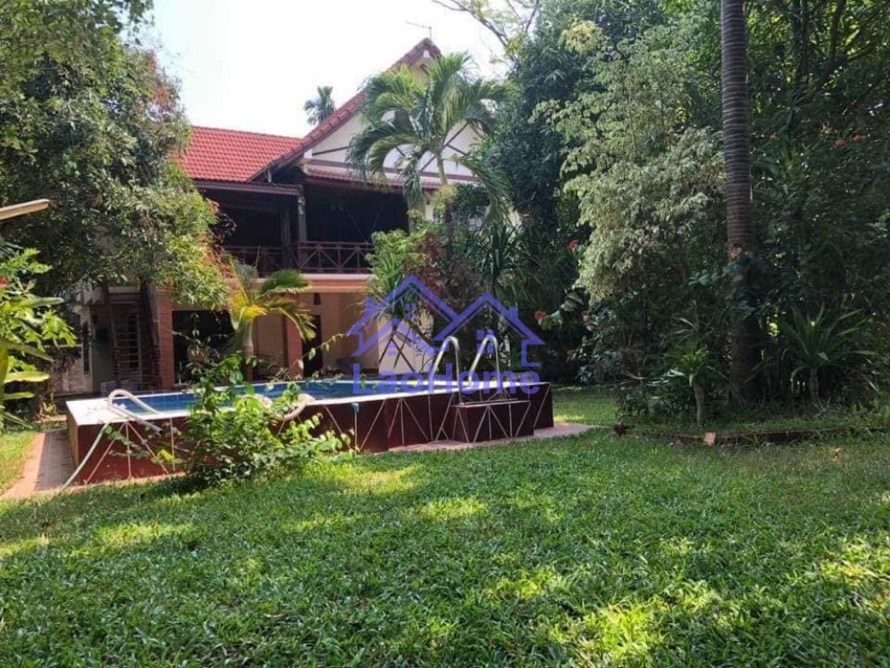 Lao style house for rent with garden and trees